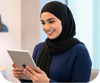 Smiling sister using tablet