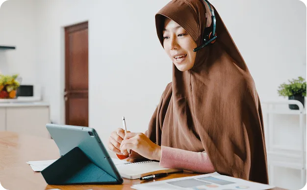 Teacher teaching Quran